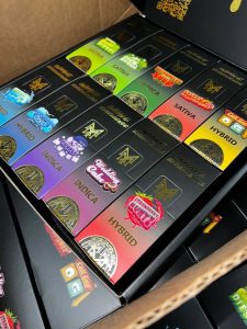 Sleek Muha Meds disposable vape pen in black, gold accents, 2g solvent-free cannabis oil, Melted Diamonds label